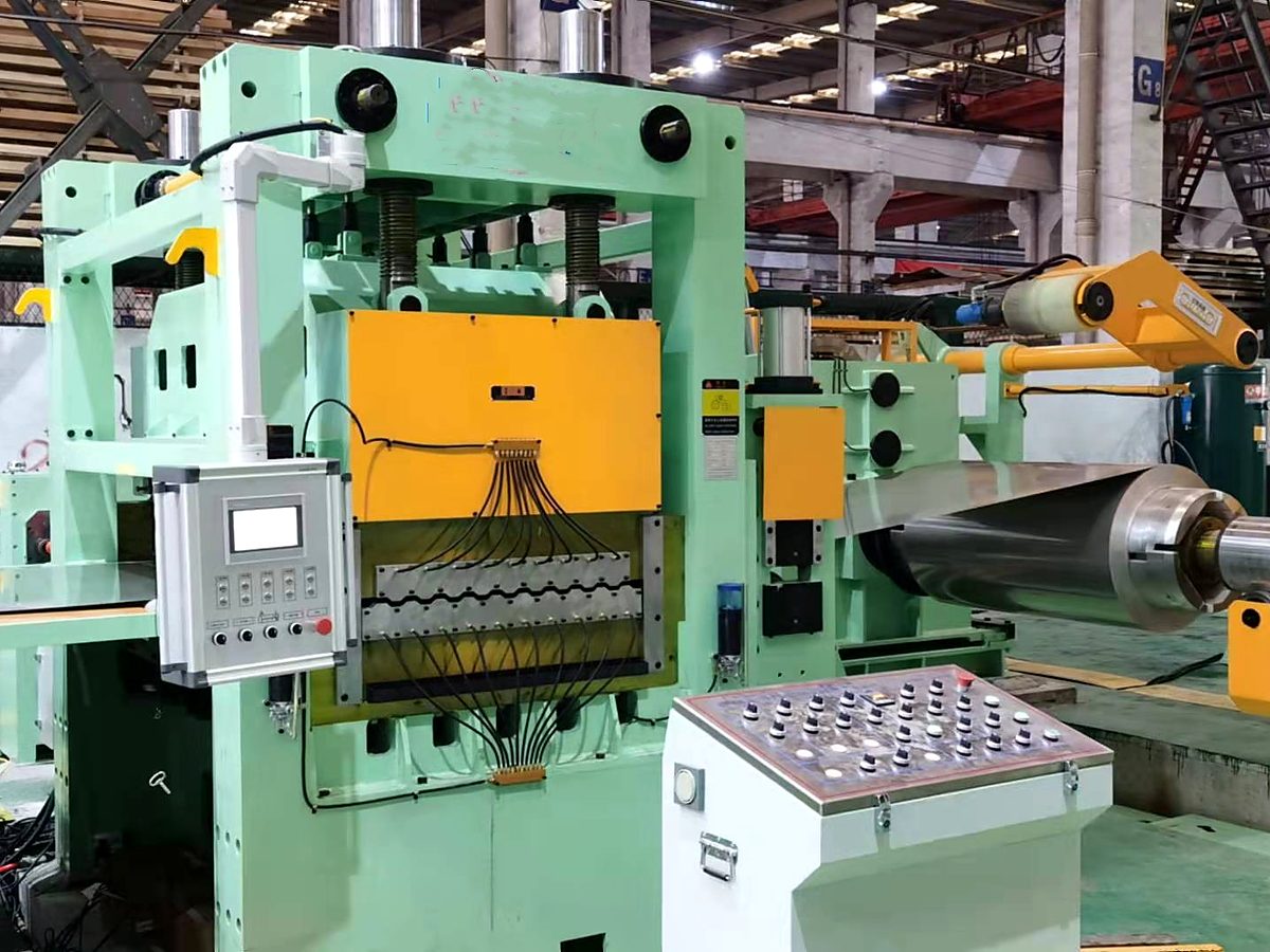 Cut to length line showing the leveler, measuring and shearing section with a steel strip running through.